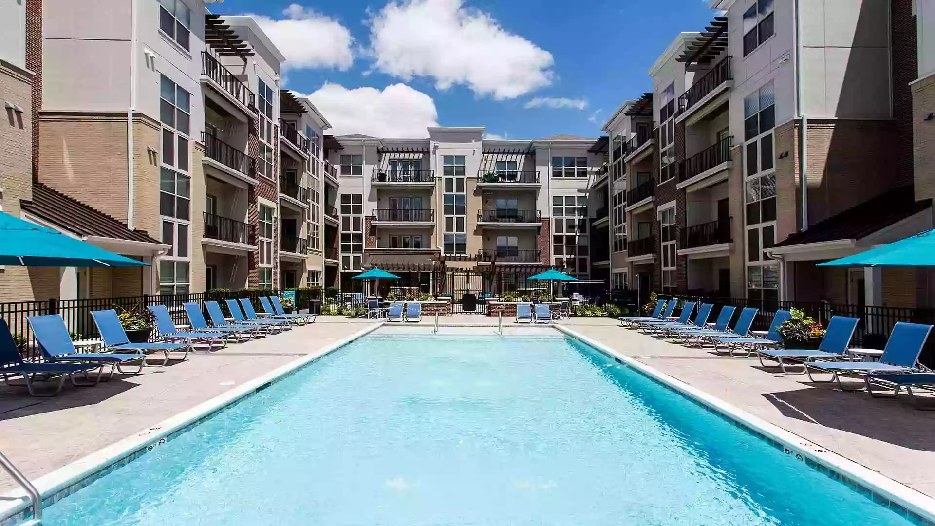 Outdoor pool and lounge area at 49Hundred.