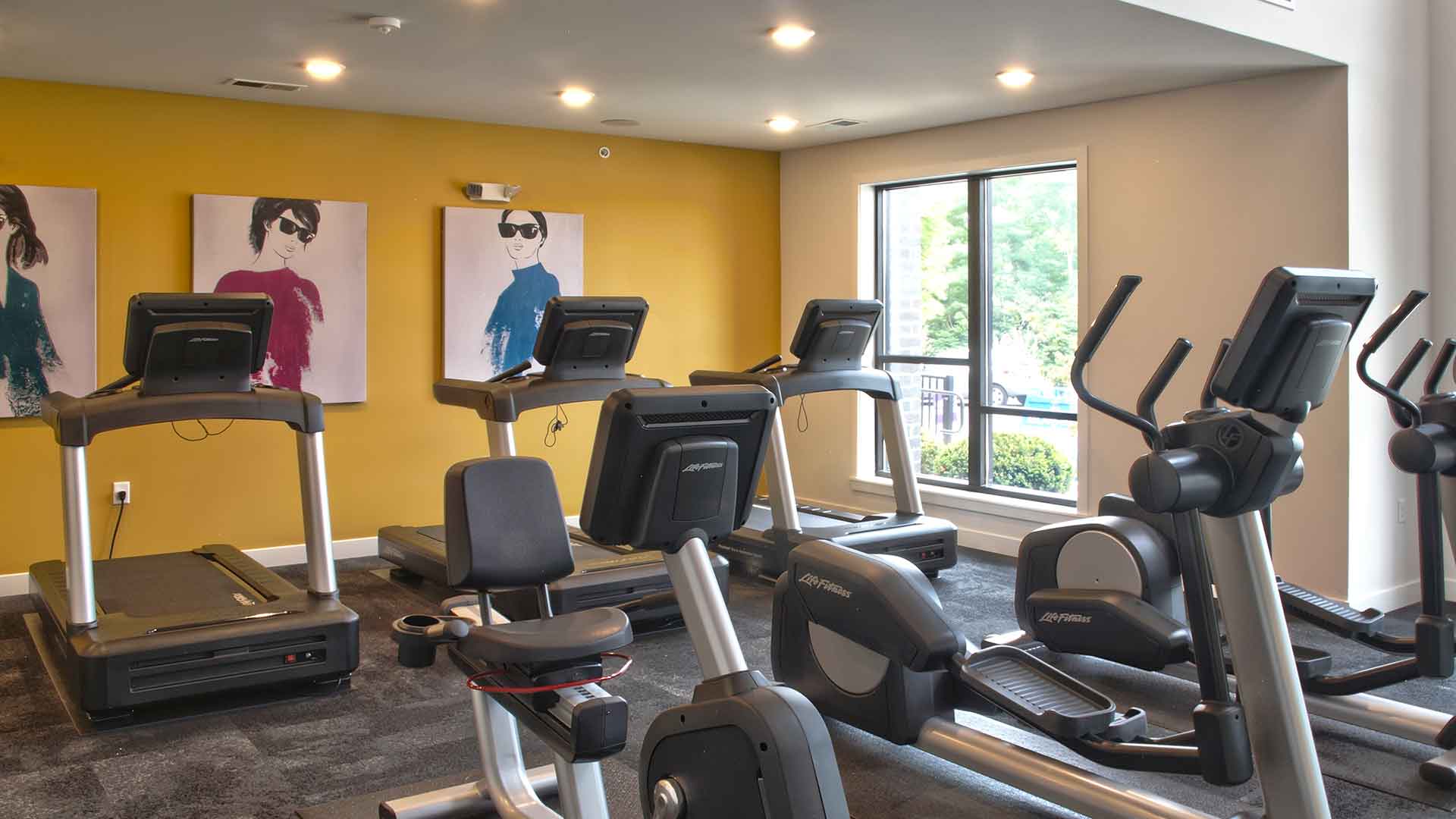 Fitness center with exercise machines at Allure.