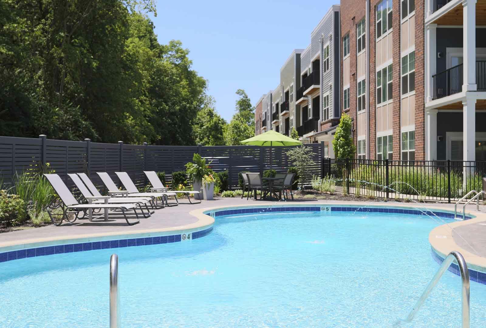 Outdoor pool and lounge area at Element Oakwood.