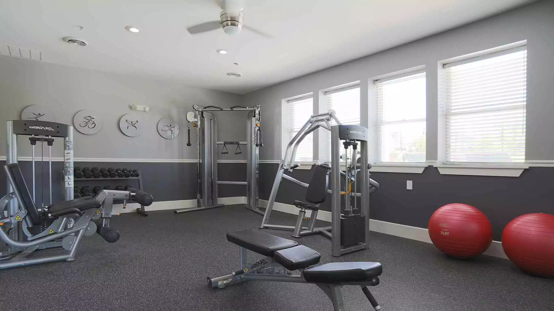 Fitness center with exercise machines and free-weights at Mallard Landing.