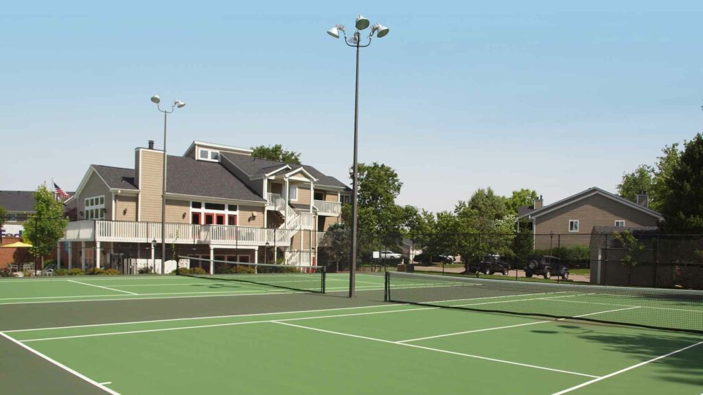 Two community tennis courts next to the clubhouse at Mallard Landing.