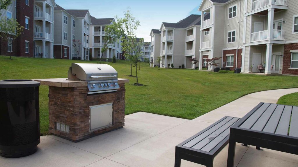 Communal electric grill and picnic table at Meridian on Shelbyville.