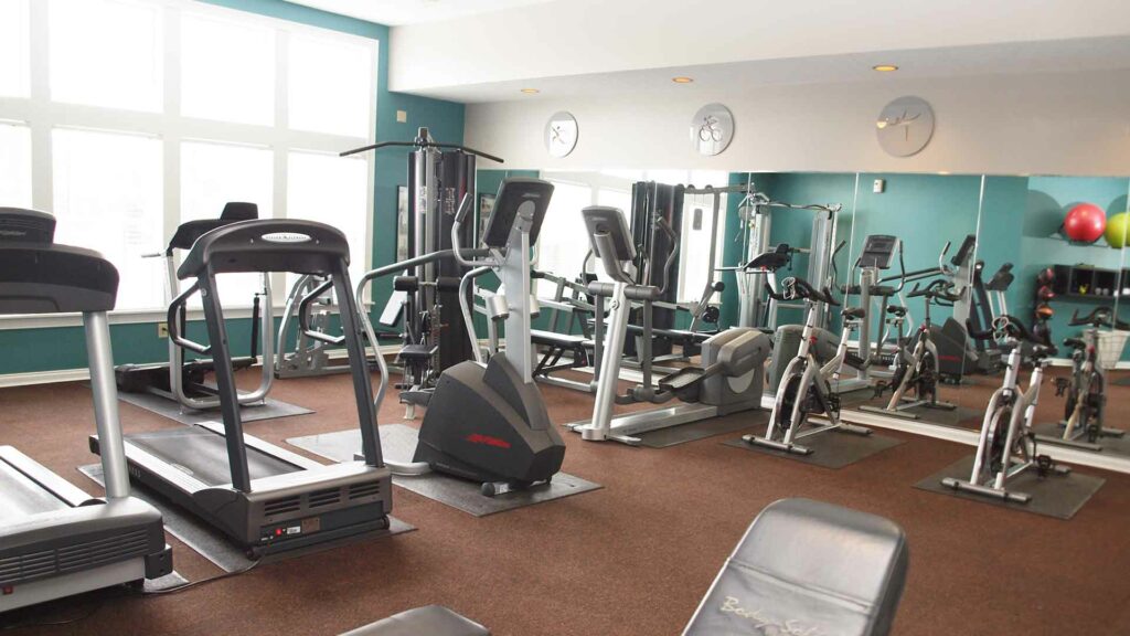 Fitness center with exercise machines at the Reserve at Miller Farm.