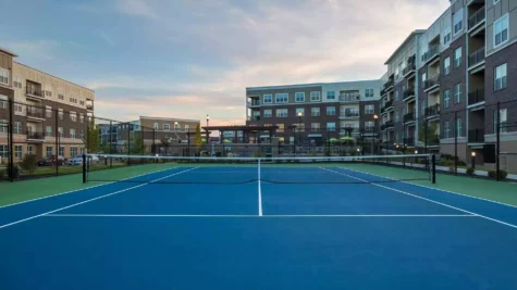 Fenced in tennis court at Savoy of West Chester.