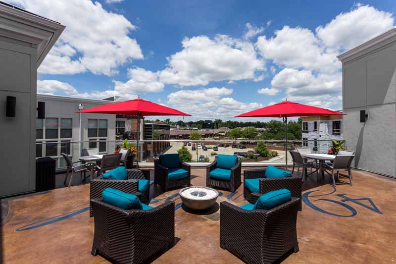Rooftop fire pit at Emerald Lakes Apartments.