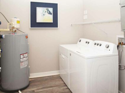 Laundry area with washer and dryer at Allure.