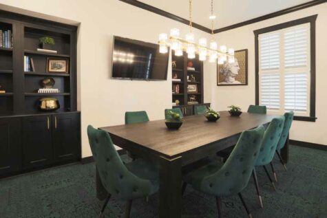 A luxury community conference room for remote work or meetings.