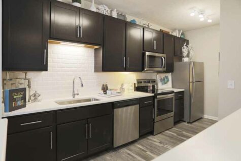 Spacious modern kitchen with stainless steel appliances at Landings at Beckett Ridge.