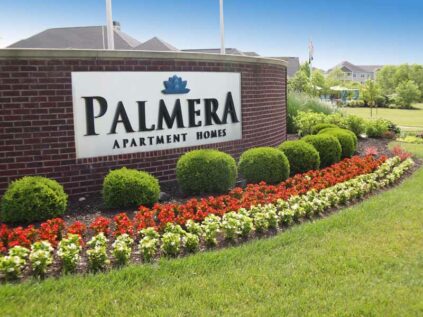 Palmera Apartment Homes sign outside the complex.