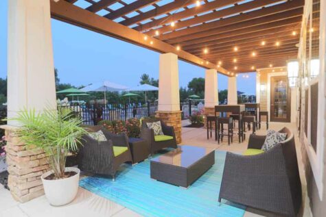 Spacious, furnished poolside outdoor patio space at Palmera.