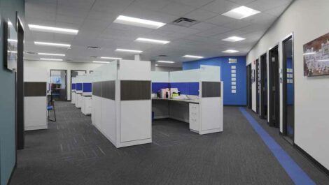 Interior office with cubicles.