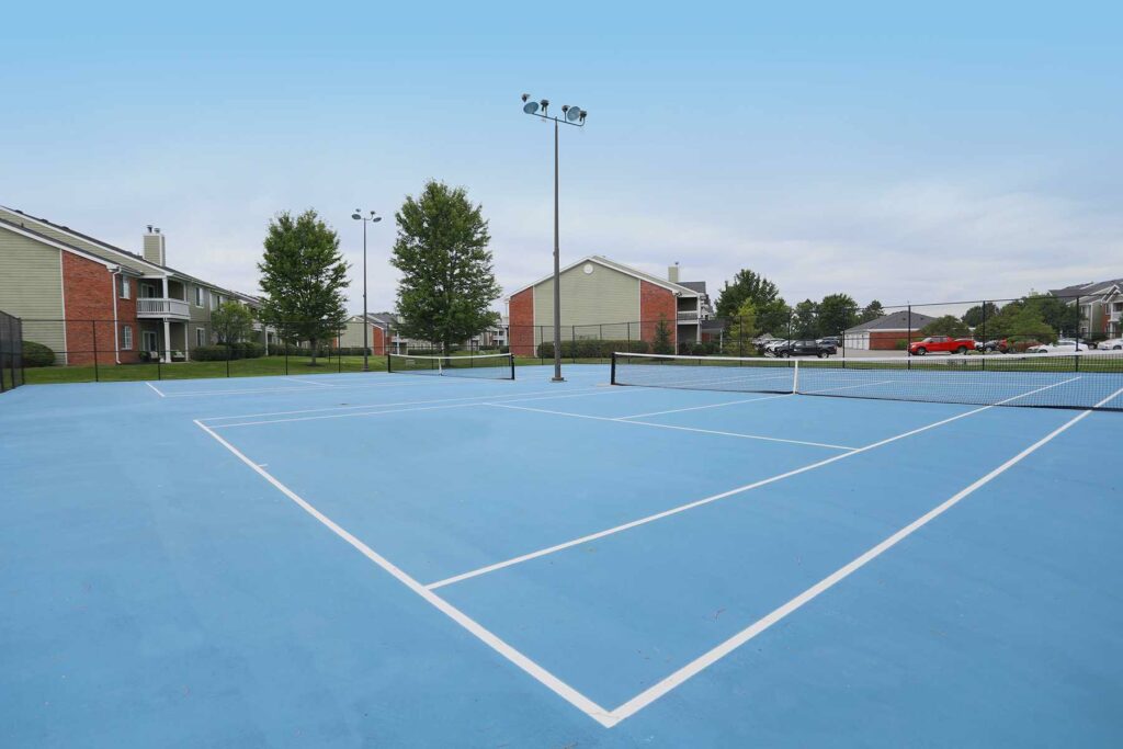 Two community tennis courts at the Reserve at Miller Farm.