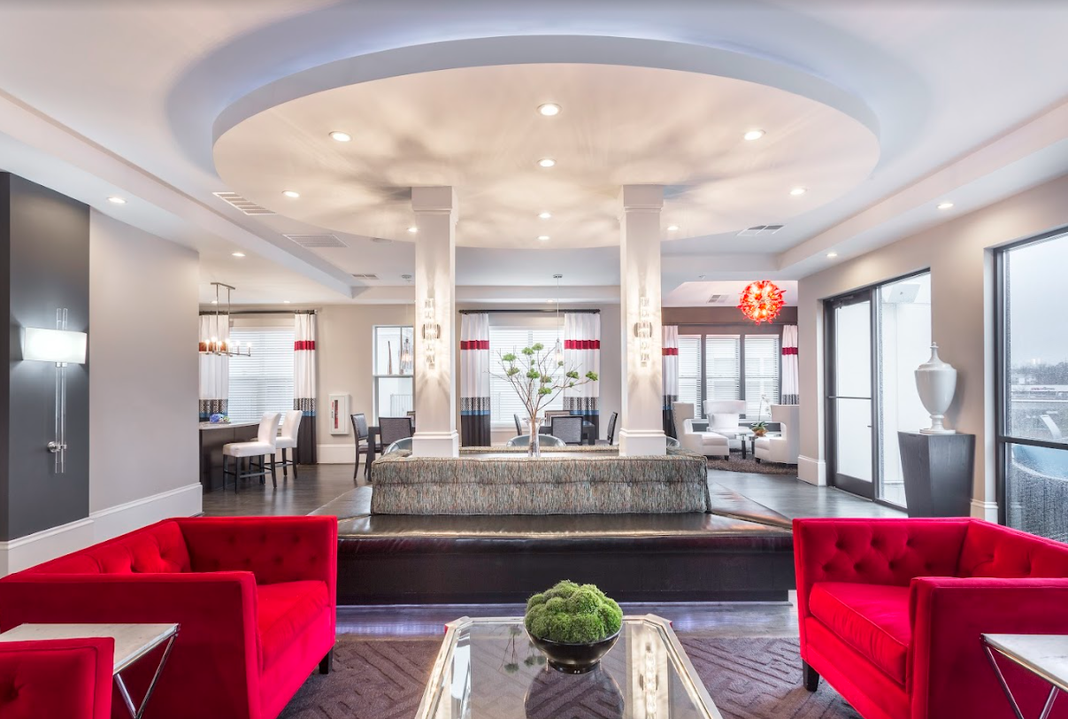 A luxury lobby space filled with ample seating and stylish decorations.