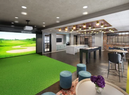 Rendering of a community lounge area with a golf simulator at Clocktower West Chester.