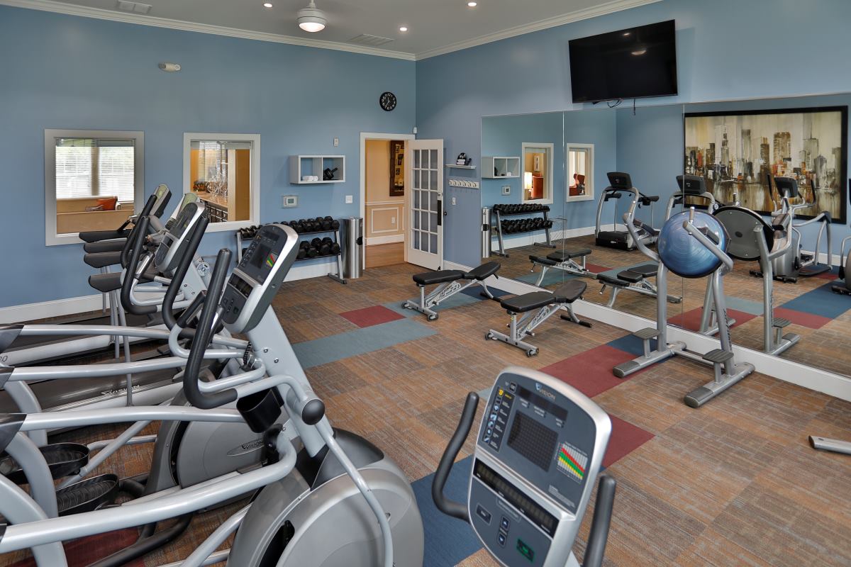 Brinley Place's fully-equipped fitness center and entrance.