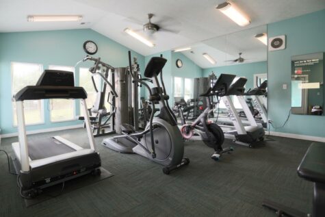 Fox Chase North's Fitness Center, featuring a spacious room with various standalone gym equipment.