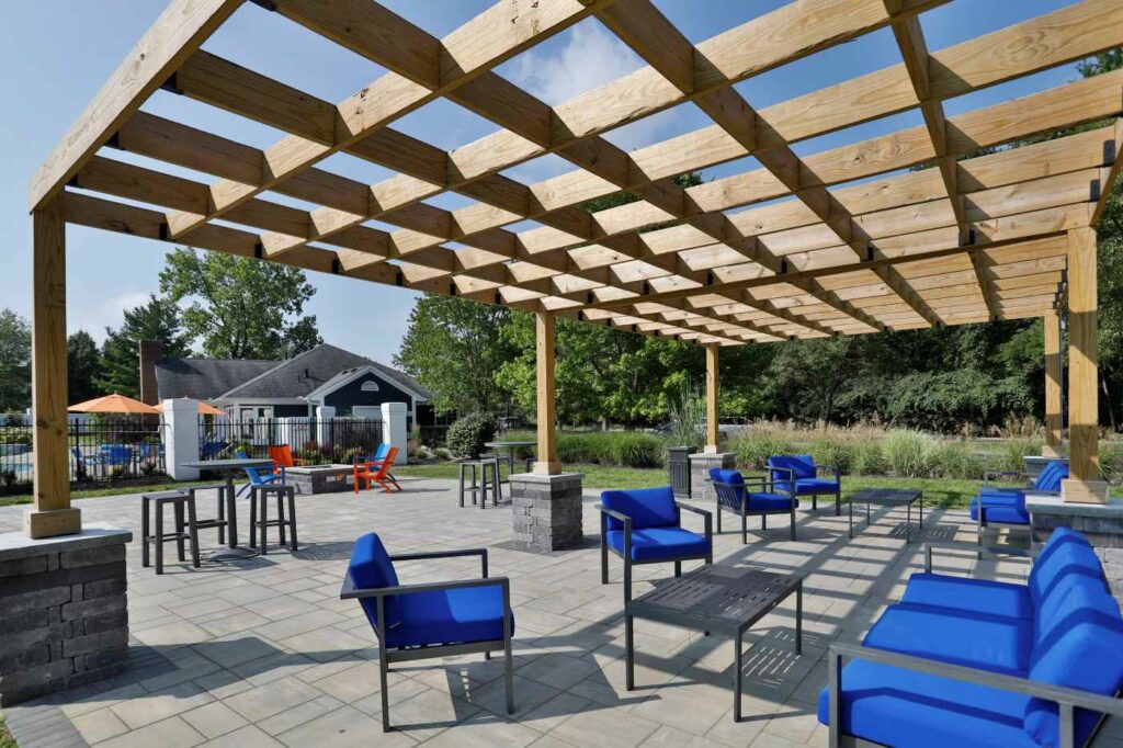 Fox Chase North's outdoor gathering space and seating area, complete with fire pit.