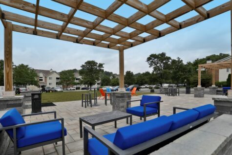 Fox Chase South's Social Deck, featuring paved areas and lounge seating.