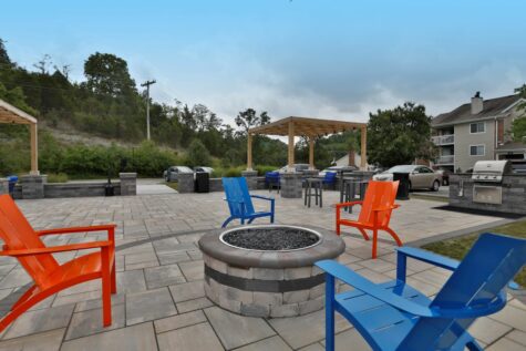 Fox Chase South's outdoor seating area, featuring a fire pit.
