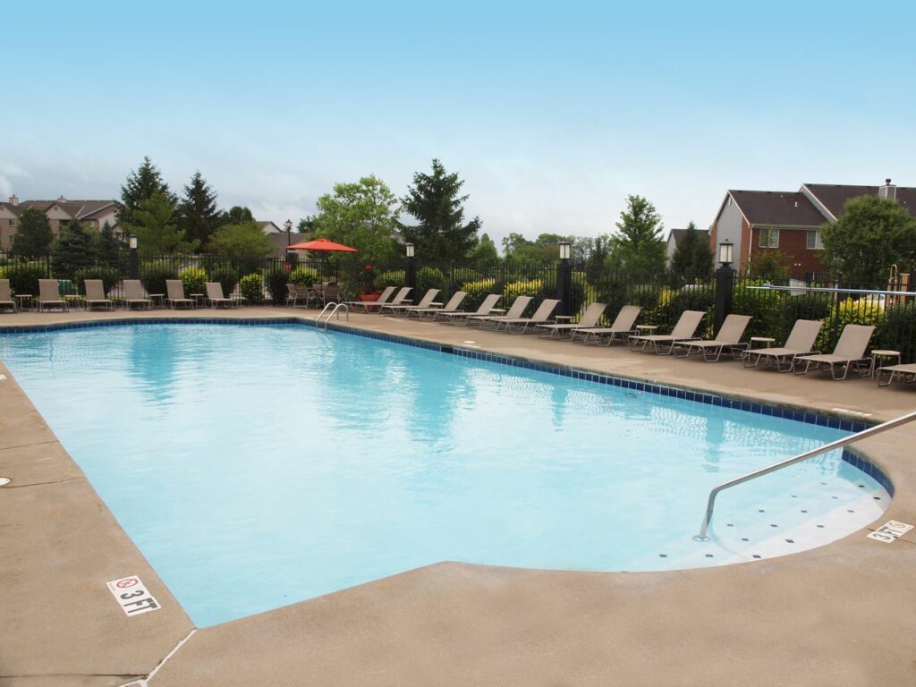 The Landings at Beckett Ridge's outdoor pool deck and seating area.