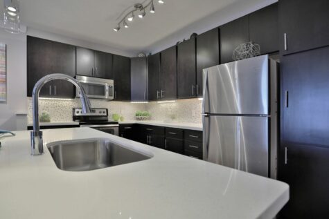 Kitchen with stainless steel appliances and island