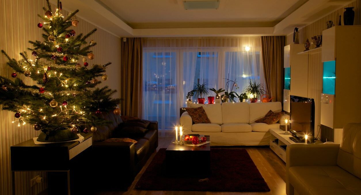 An apartment home filled with holiday decorations for Christmas.