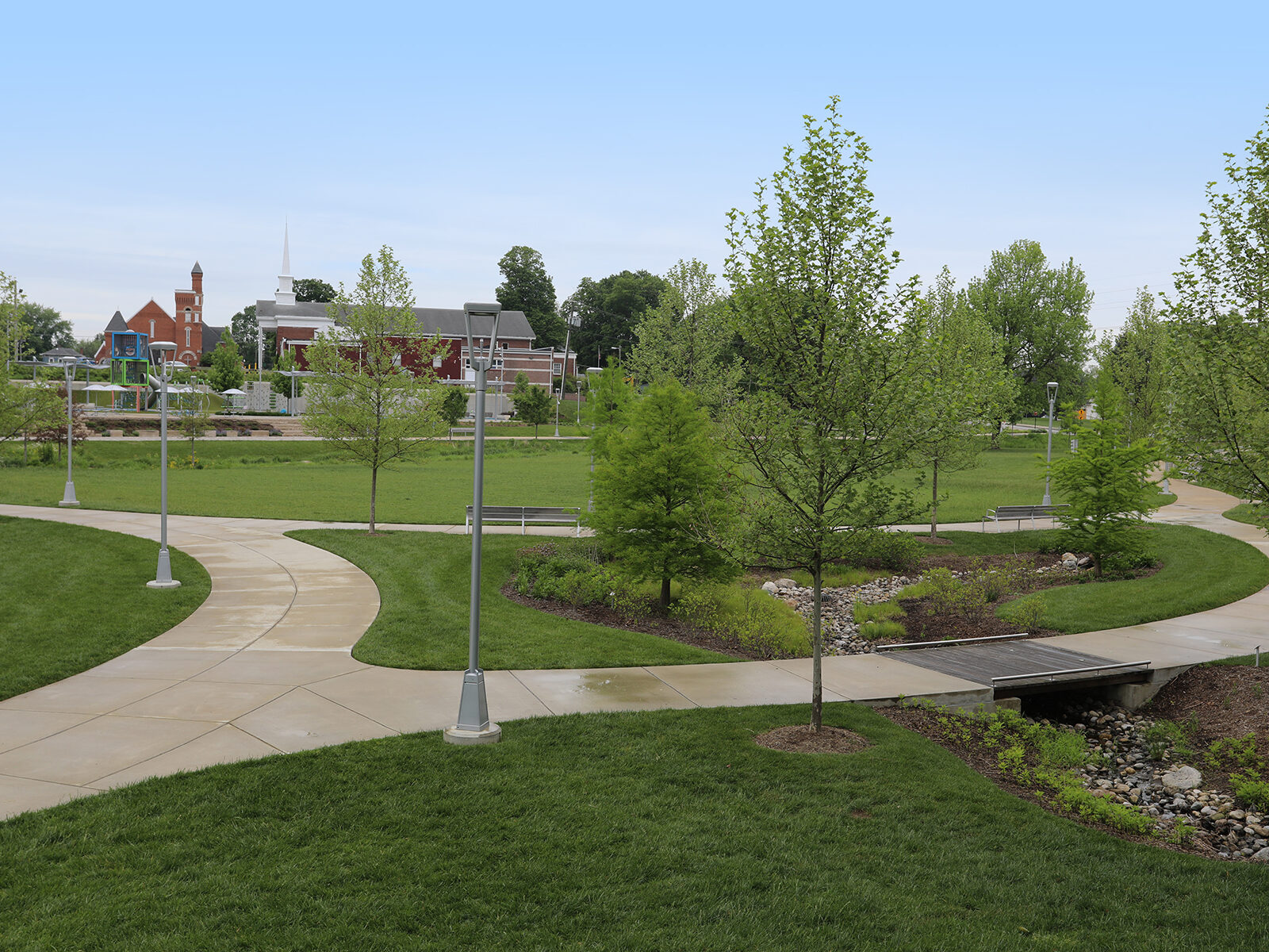 Photo of a local park in Greenwood, Indiana, located just minutes from Emerald Lakes Apartments, featuring open green space, mature trees, walking paths, and a peaceful natural setting.