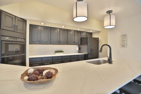 Wellington Place clubhouse, kitchen area in Fishers, IN. Plenty of counter space, sink, oven and refrigerator.