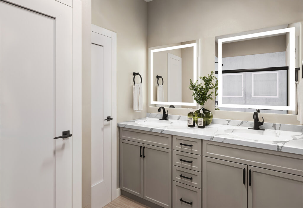 Spa-inspired bathroom at Relay 129 in Liberty Township with marble tile, LED mirror, and matte black finishes.