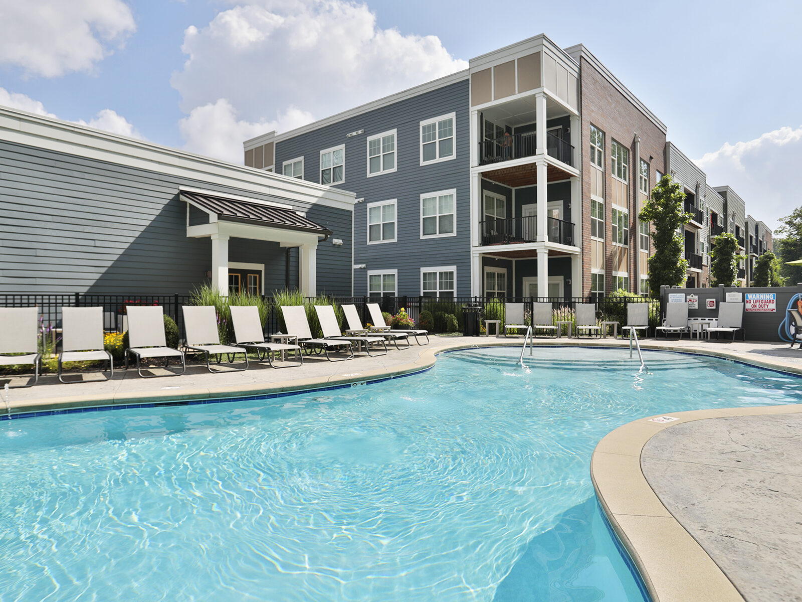Element Oakwood Sparkling Swimming Pool with Sundeck.