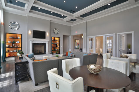 Clubhouse and leasing office at Kendal on Taylorsville featuring inviting lounge seating and a modern coffee bar, creating a warm and welcoming space for residents and guests.