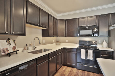 Bright kitchen at Kendal on Taylorsville offering a spacious layout with modern finishes and stainless steel appliances.