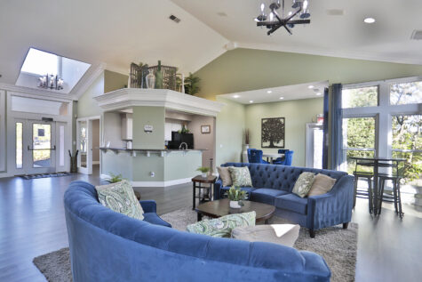 Waterford Place residential clubhouse with kitchen and seating.