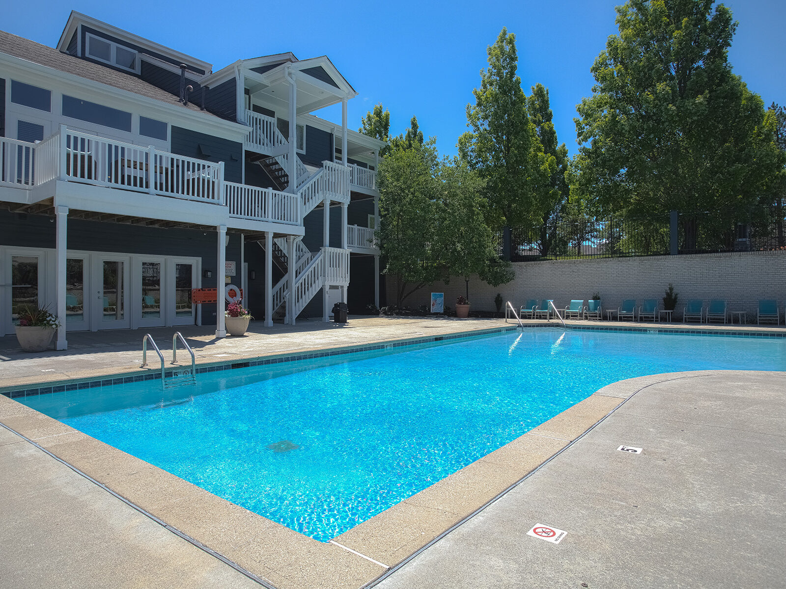 Sparkling community pool at Island Club Apartments near Maineville, Ohio, providing a refreshing retreat for residents throughout the season.