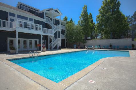Sparkling community pool at Island Club Apartments near Maineville, Ohio, providing a refreshing retreat for residents throughout the season.