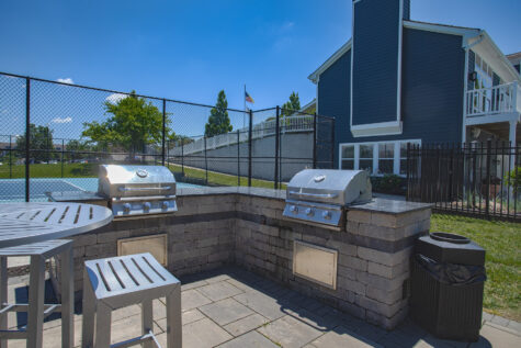 Relaxing social deck at Island Club Apartments near Maineville, Ohio, providing an inviting outdoor space for gathering and unwinding.