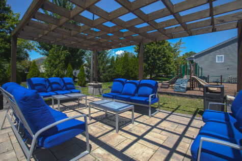 Relaxing social deck at Island Club Apartments near Maineville, Ohio, providing an inviting outdoor space for gathering and unwinding.