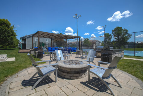 Outdoor social deck at Island Club Apartments in Deerfield Township, Ohio, featuring comfortable seating and scenic views for residents to enjoy.