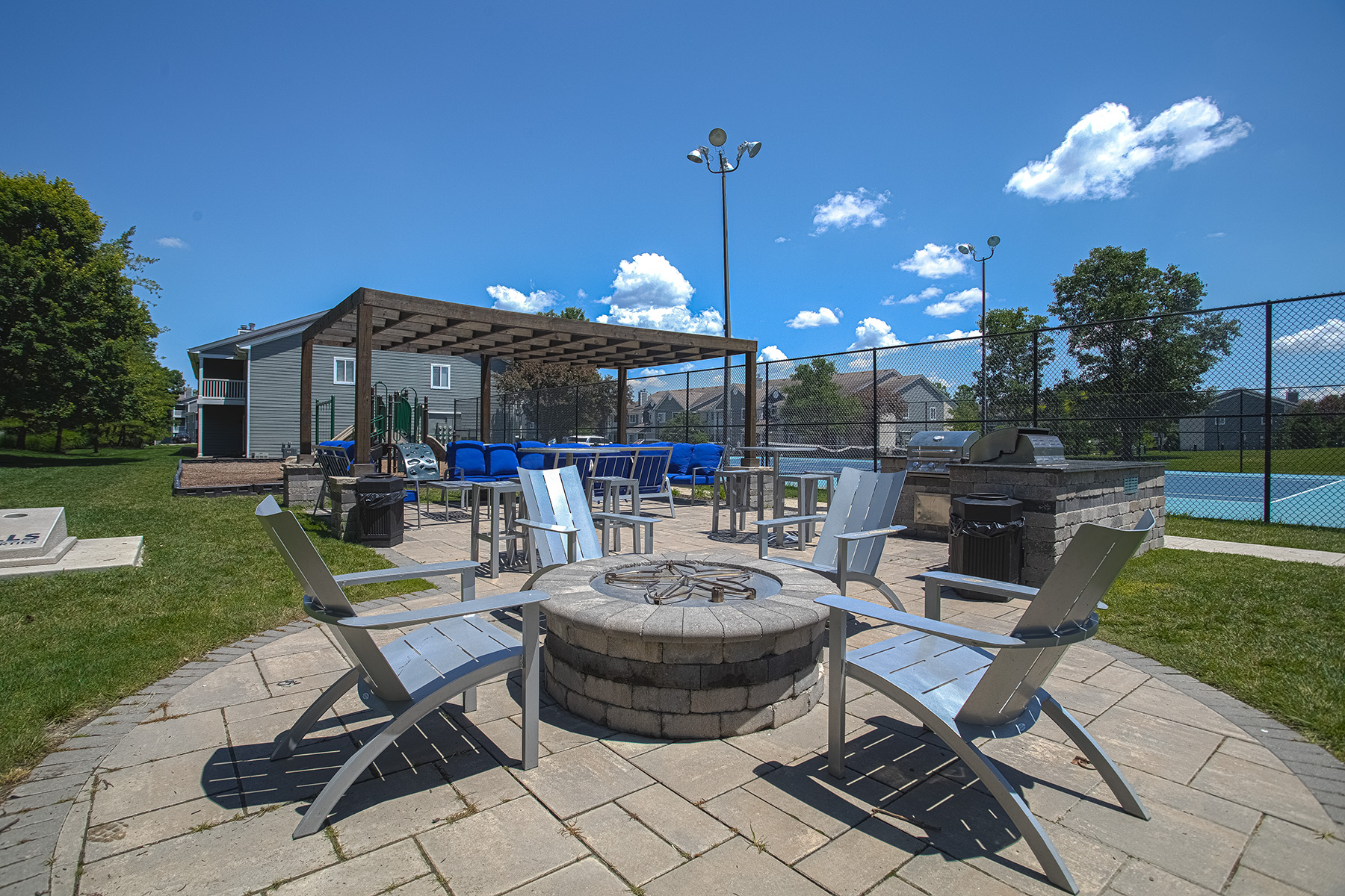 Outdoor social deck at Island Club Apartments in Deerfield Township, Ohio, featuring comfortable seating and scenic views for residents to enjoy.