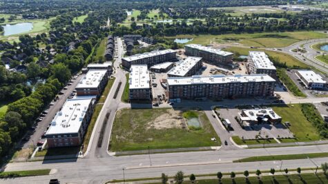 Panoramic aerial view of Relay 129 Apartments and Townhomes in Liberty Township, Ohio, highlighting luxury apartment buildings, townhomes, clubhouse, and the growing mixed-use neighborhood.