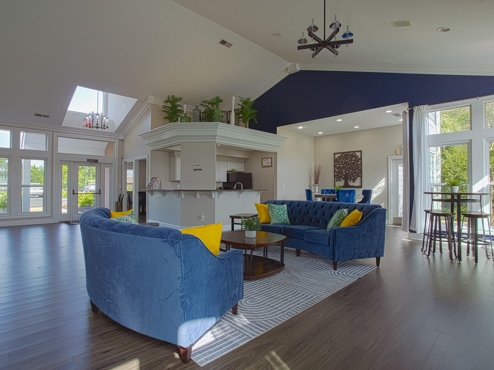 Bright and inviting clubhouse interior at Waterford Place Apartments in Loveland, Ohio, offering comfortable seating areas and community gathering spaces.