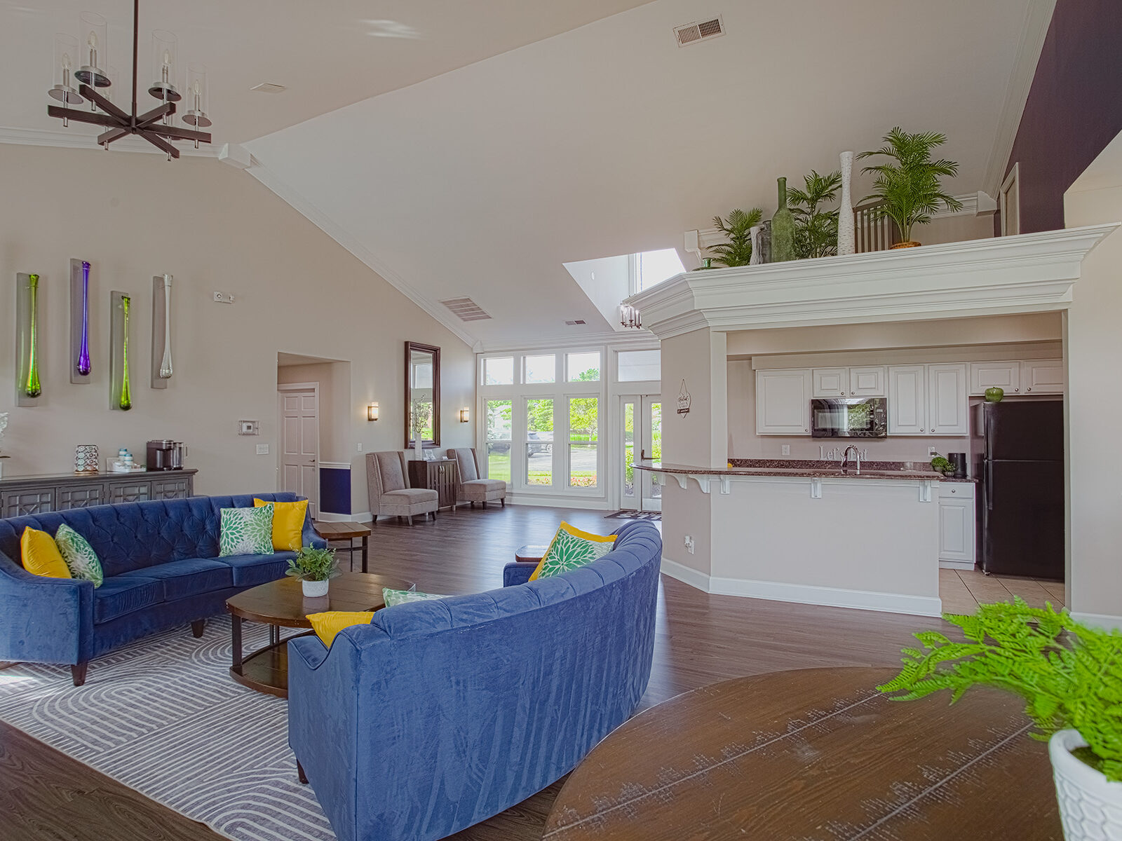Bright and inviting clubhouse interior at Waterford Place Apartments in Loveland, Ohio, offering comfortable seating areas and community gathering spaces.