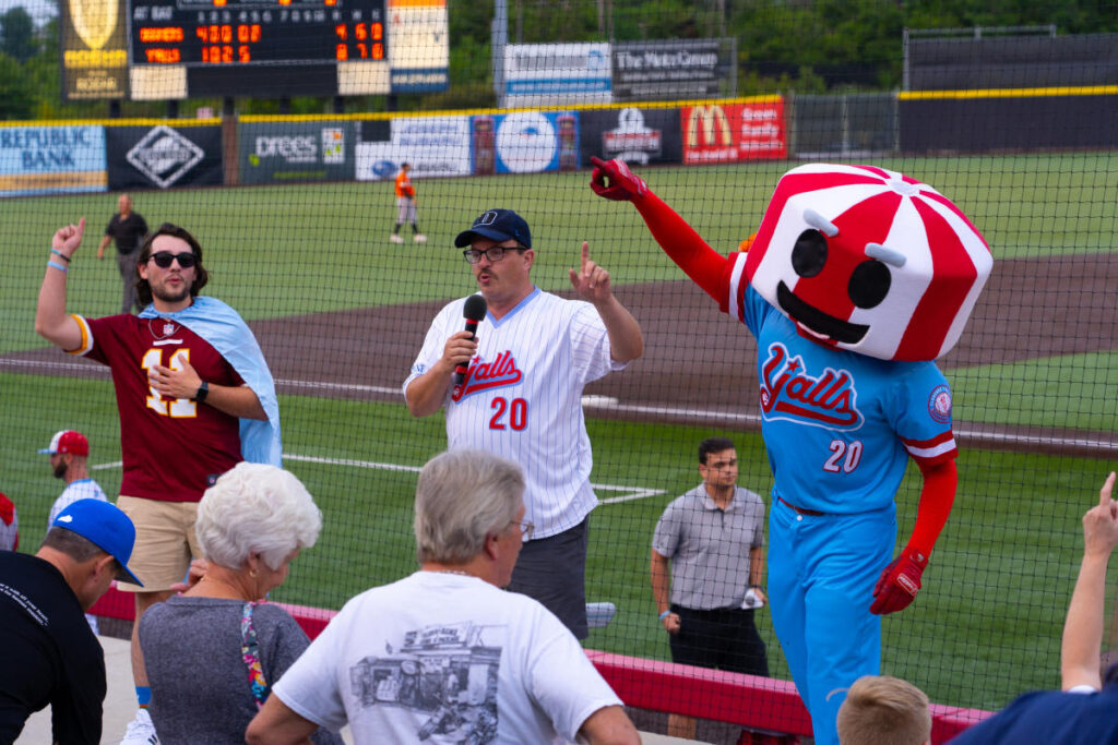 Yalls mascot with fans at the Thomas More Stadium.